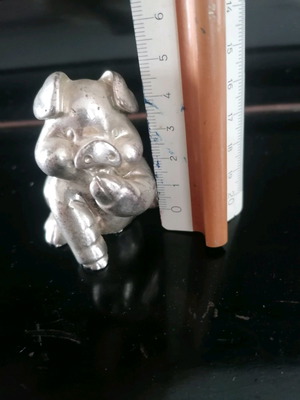 Silver piglet figurine used, not solid silver