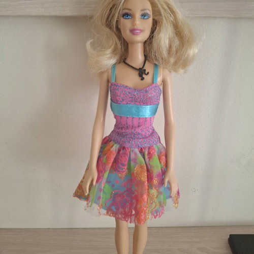 Barbie doll with colorful dress new