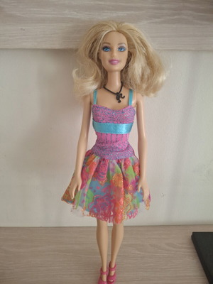 Barbie doll with colorful dress new