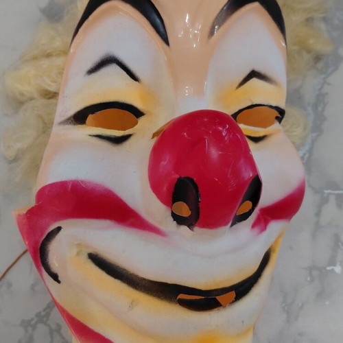 Vintage clown carnival mask from the 70s, used