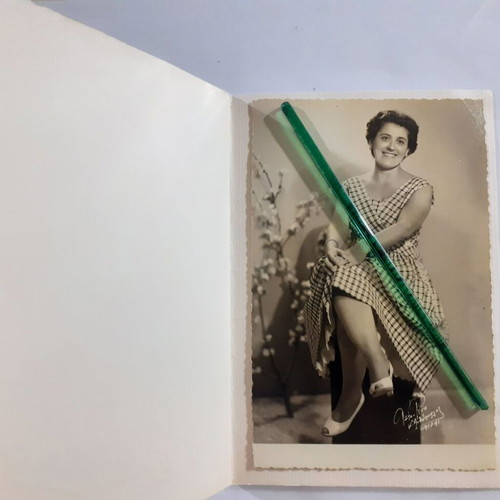 Two identical vintage photos of a woman in a photo studio, pack