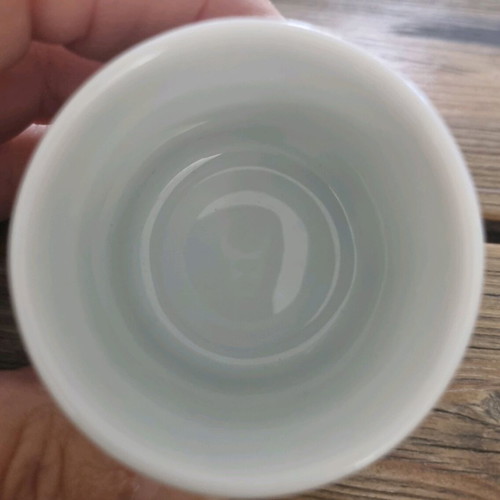 Porcelain branded special shot glass unused