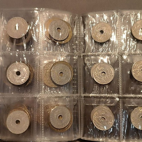 Album of 60 collectible coins