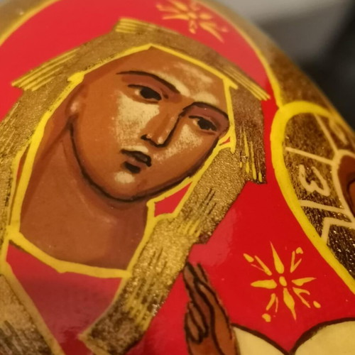 Russian egg used with hand-painted decoration and wooden base