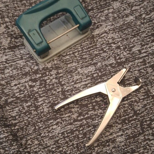 Perforator and staple remover used, functional