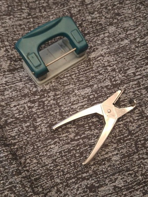 Perforator and staple remover used, functional