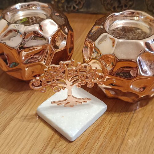 Decorative candle holders and tree of life set rose gold like new