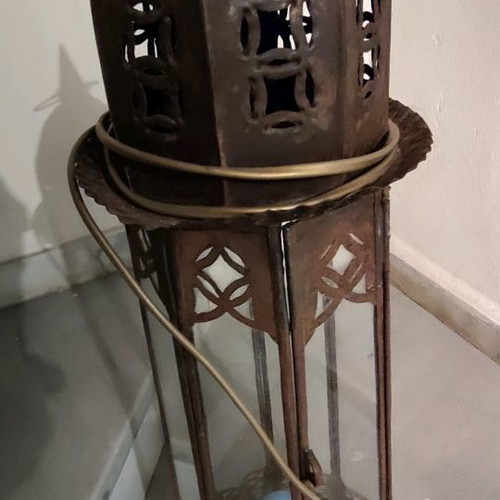 Metal vintage decorative garden lantern used with blue lighting