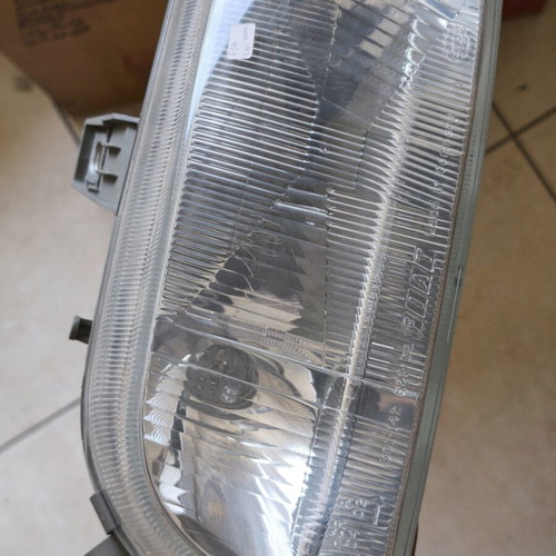 Fiat Punto MK1 left front headlight, genuine, with two bulbs, no cap
