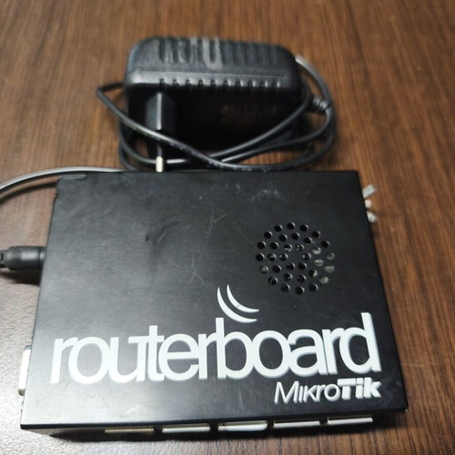 MikroTik RouterBOARD RB450Gx2 Gigabit Router used with power supply