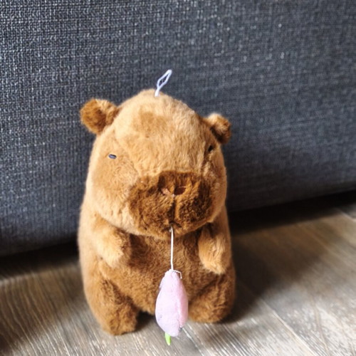 Capybara plush toy with pull carrot, like new