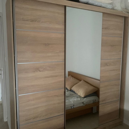 Three-door sliding wardrobe like new