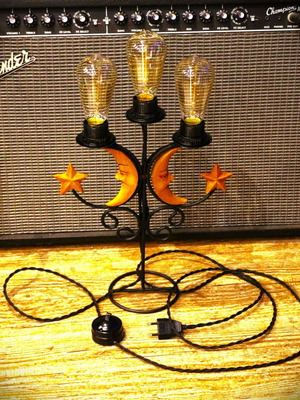 Vintage lamp with 3 Edison bulbs and carved moon designs