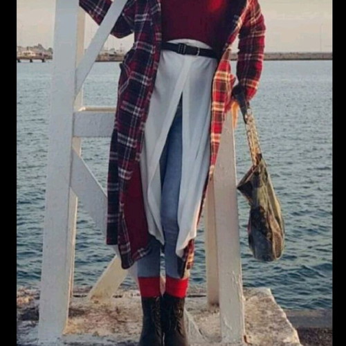 Checked coat size Small like new with belt and stitched pockets