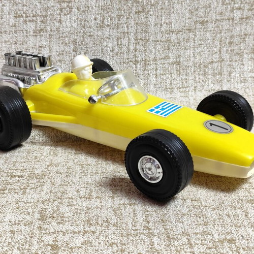 Formula 1 toy car new plastic vintage 70s yellow without box