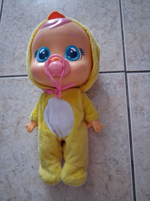 As Cry Babies Doll (Duck) like new with pacifier