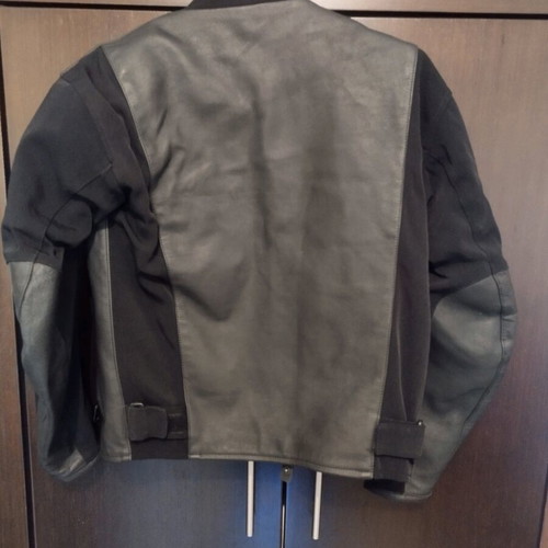 Colori women's motorcycle jacket like new, size small with shoulder protection