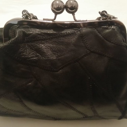 Custo black leather handbag used with straps