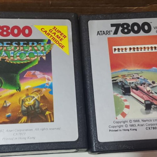 Atari 7800 console used with 2 joysticks and games