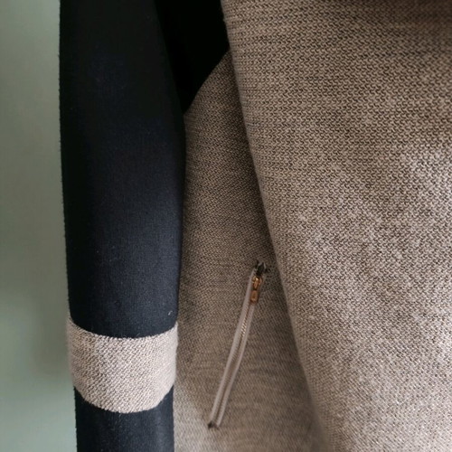 Short women's coat with a waterfall collar