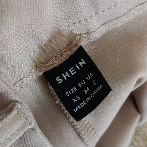 Beige bell-bottom pants new with belt, size XS