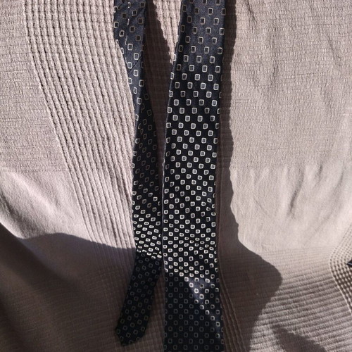 Artisti Italiani men's tie with dark blue lacunary pattern, new