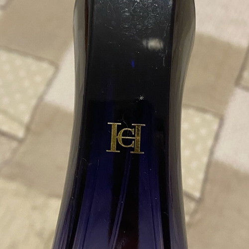 Carolina Herrera Good Girl Eau de Parfum bottle used, empty