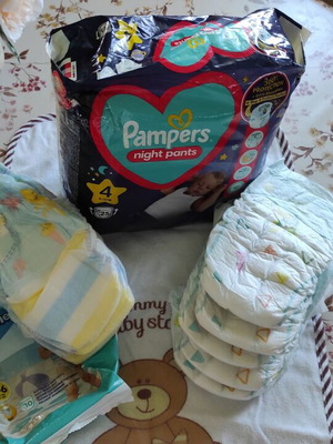 Pampers diapers new, pack of 28 including size 5 and swim diapers