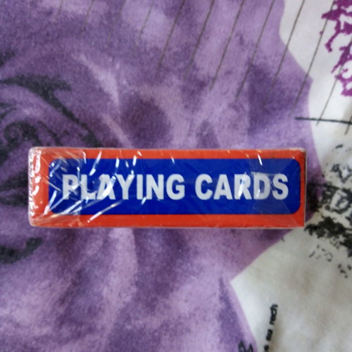 Playing cards new in sealed pack with 54 cards