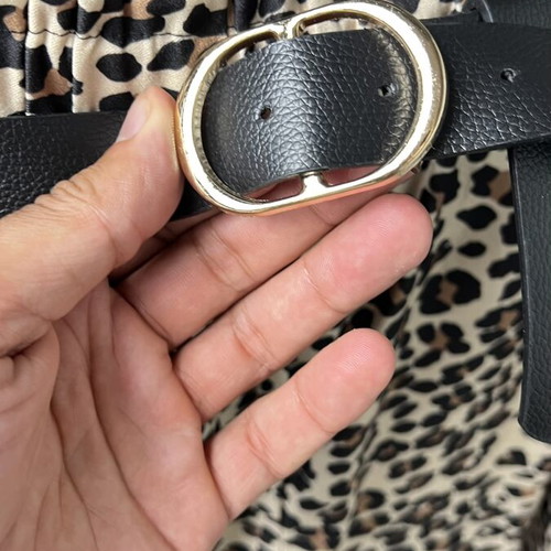 Leopard print pants with leather belt and gold buckle like new