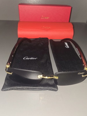 Cartier sunglasses new with brown frames and black lenses