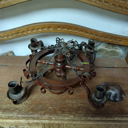 Chandelier made of wrought iron like new, rustic style with wood