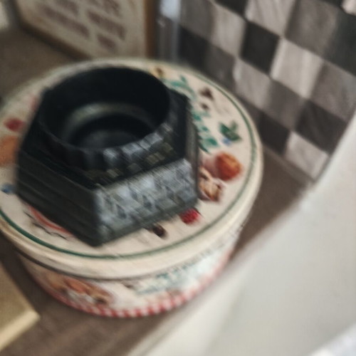 Candle holder used, church-shaped without glass cup, black