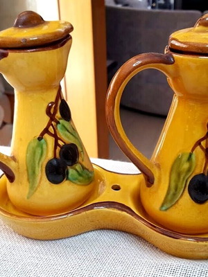 Vintage French ceramic oil and vinegar set used with lids and base
