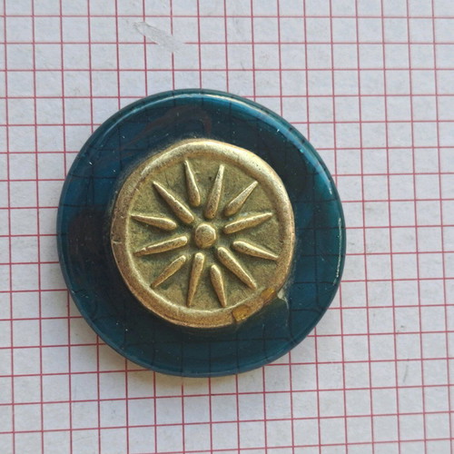 Paperweight with Vergina Star used, brass on glass base