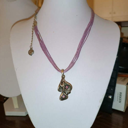 Necklace new with leather cords and silver, design with purple strass stones