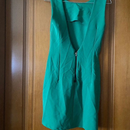 Green dress with open back used, with gold zipper