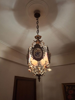 Bronze antique lamp with porcelain embossed designs used