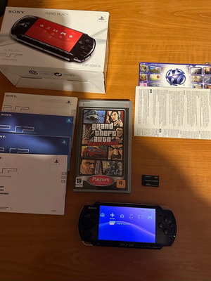 Sony PSP Slim като нов с кутия, инструкции, игра и 64GB карта памет