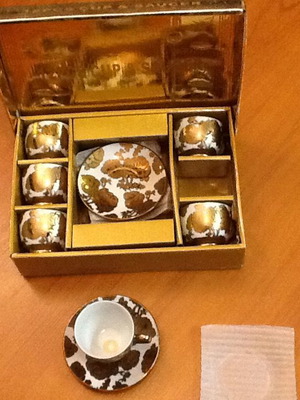 Porcelain coffee cup set new with gold overlay in original box