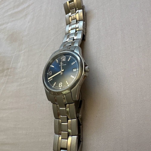 Candino Swiss watch titanium with blue dial and silver bracelet like new