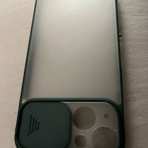 iPhone 13 / 14 phone case used, transparent with green border