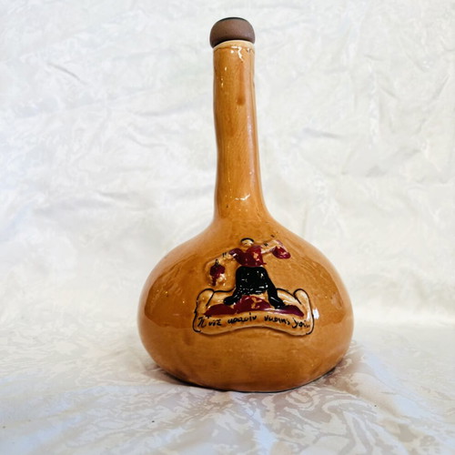 Vintage collectible 1965 glazed ceramic wine bottle used
