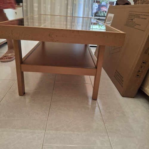 Wooden coffee table with display frame and lower shelf