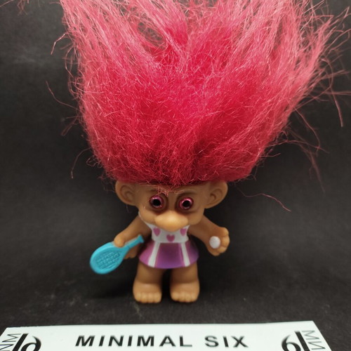 Troll Tennis Player figure with fuchsia hair and eyes
