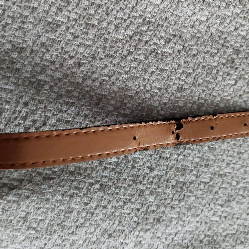 Women's belt used tan with silver buckle