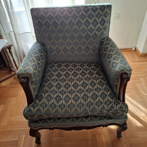 Vintage three-seater sofa and two antique armchairs with dark wood frame