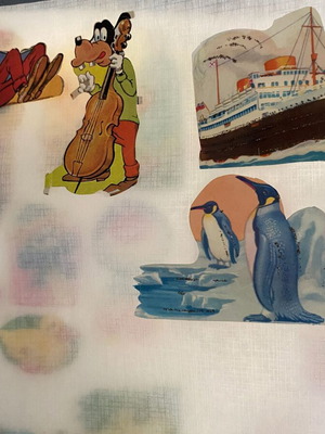 Vintage Disney Goofy die-cut scraps set of 4 with ship and penguins