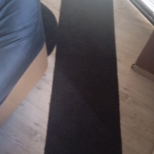 Black interior vintage runner rug used, minimalist design