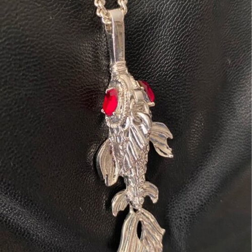 Unisex faux bijoux fish necklace with stone eye, rare, new